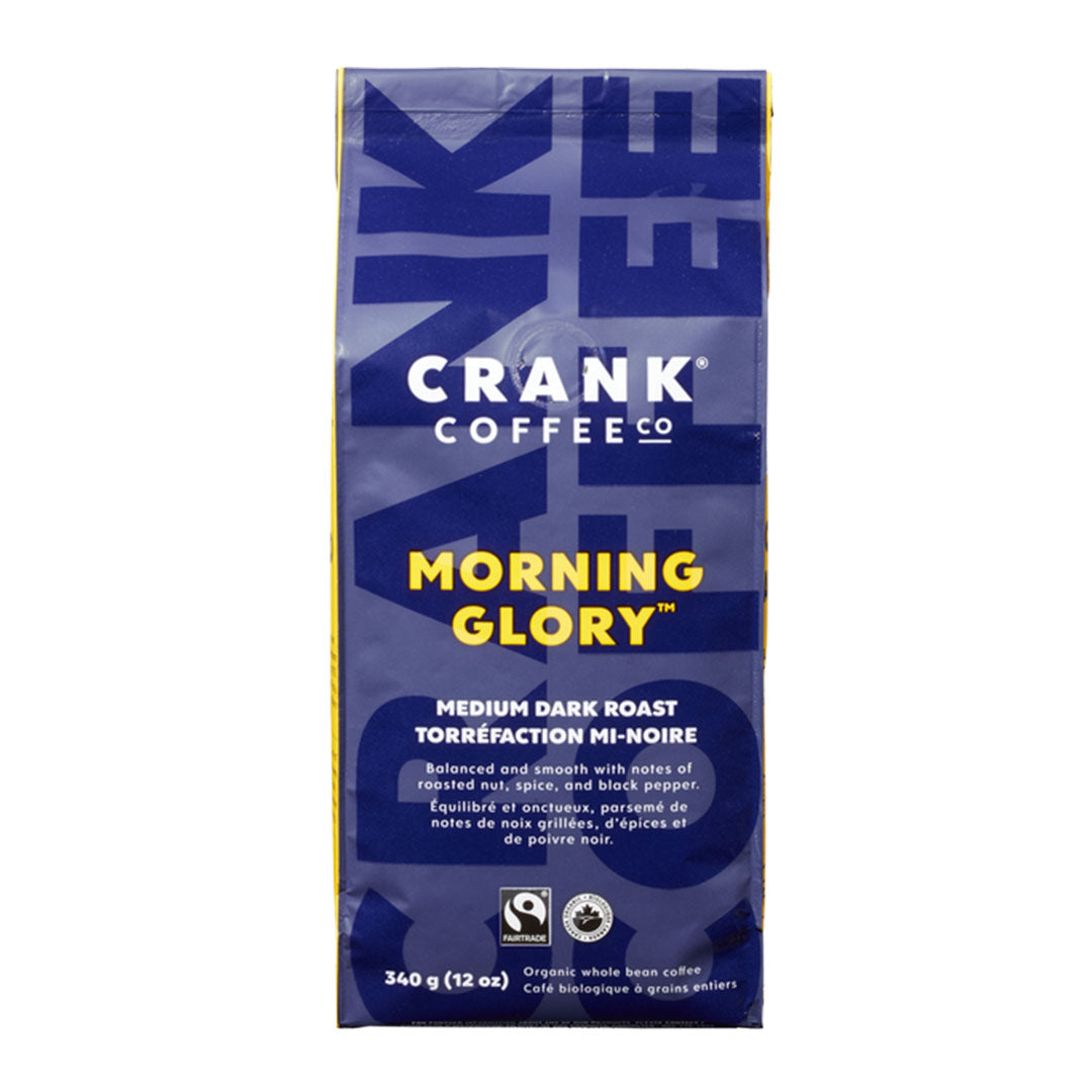 A product shot of a bag of Crank Coffee Morning Glory coffee beans. It is a medium dark roast bar blend that combines two separate roasts for a complex flavour.